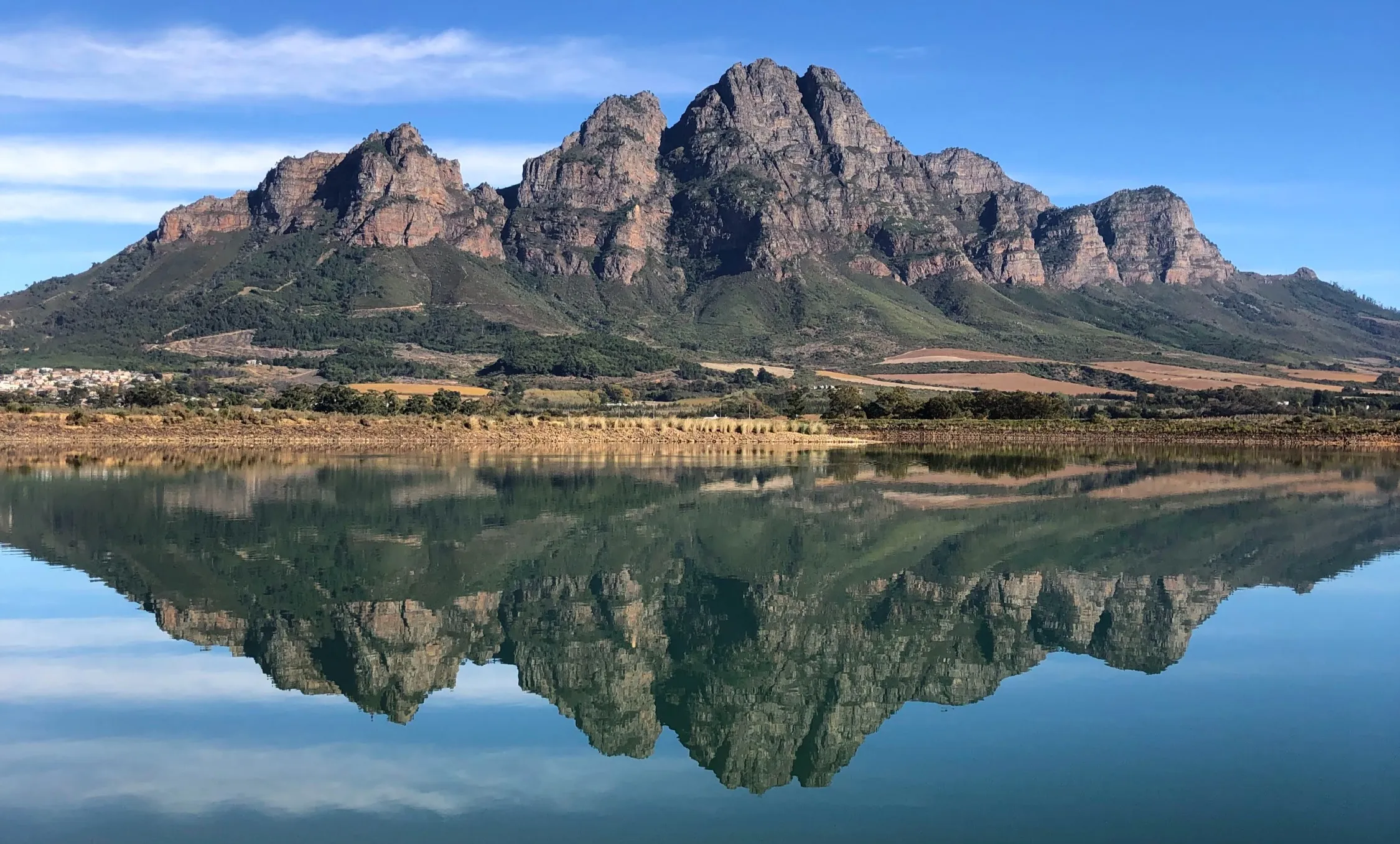 Simonsberg mountain mirrored in a dam over the Stellenbosch winelands